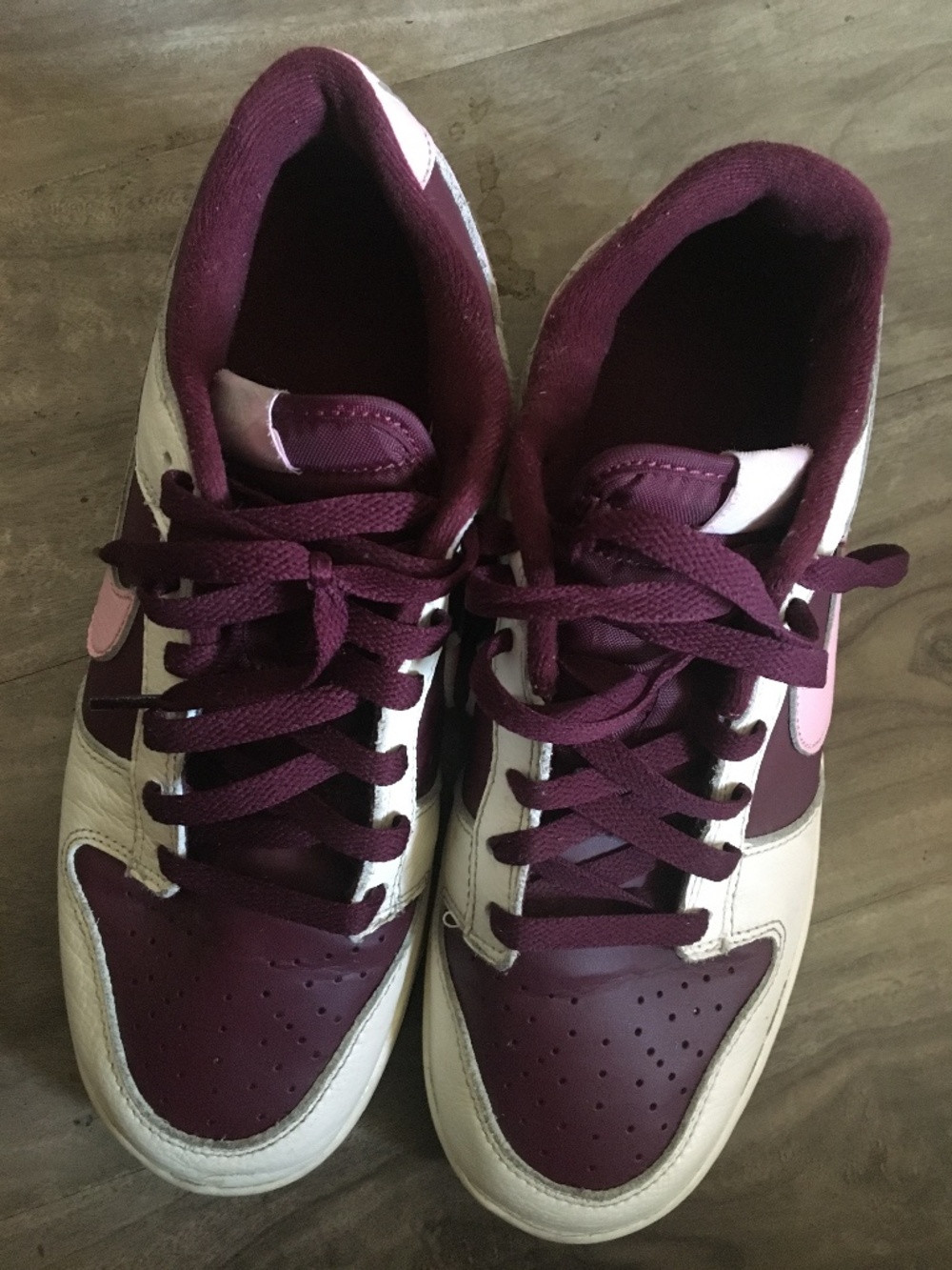 Burgundy and light pink Nikes